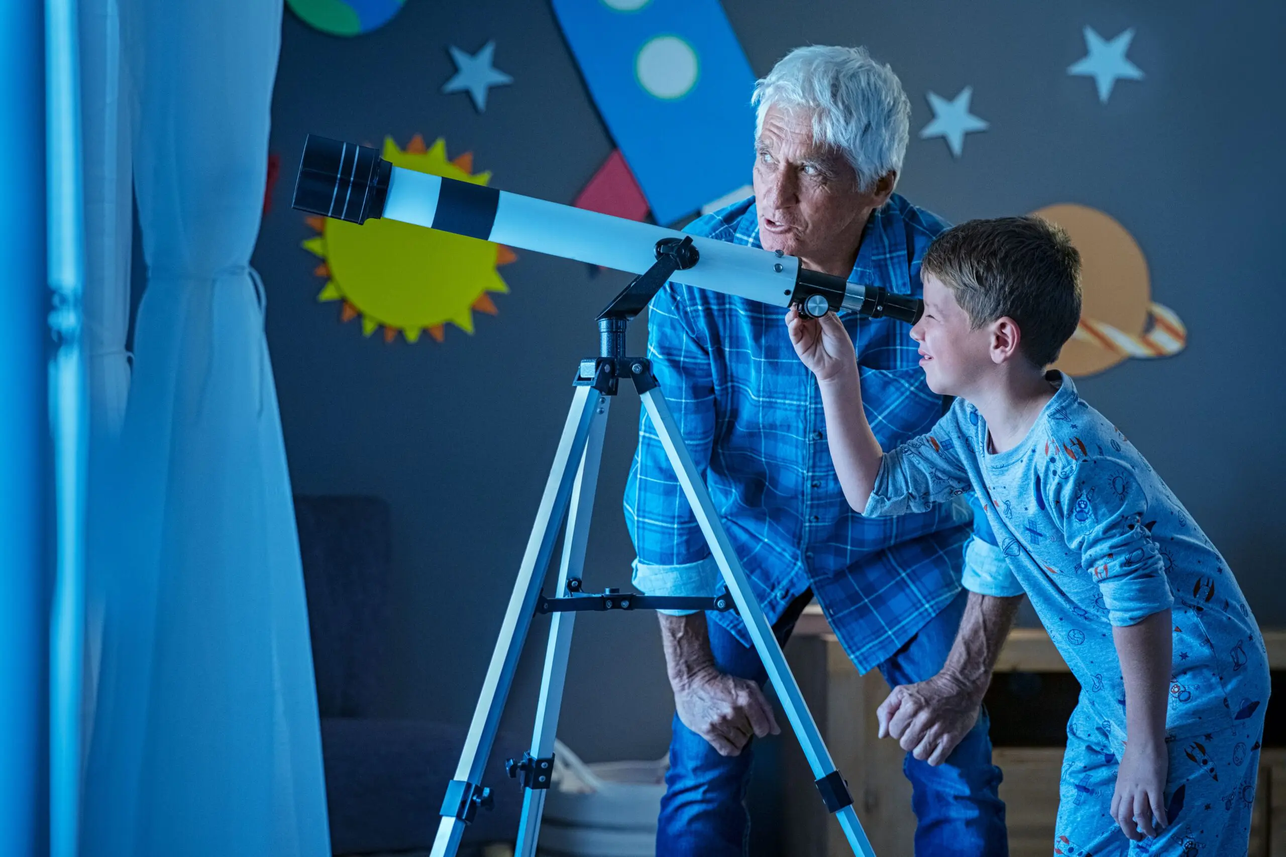 child-with-grandfather-using-telescope-during-nigh-2023-11-27-04-56-24-utc-min